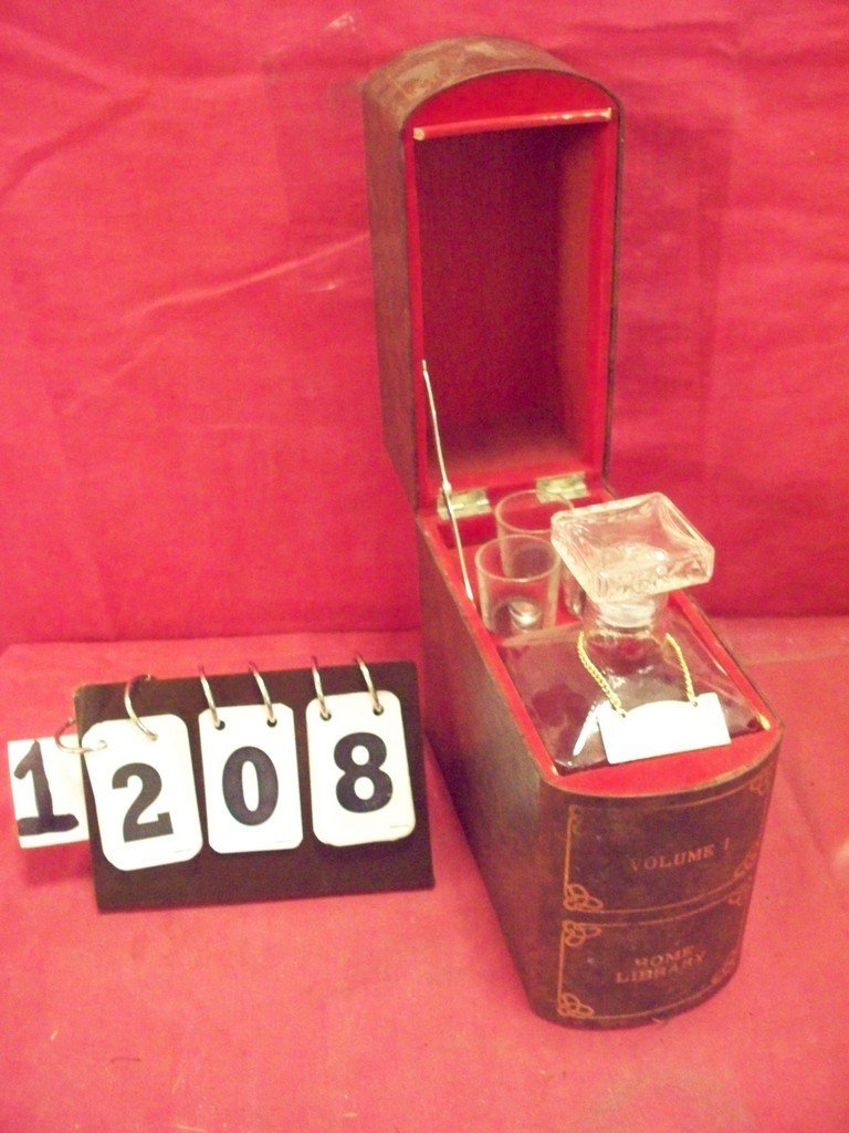 HIDEAWAY DECANTER - WITH 3 SHOT GLASSES - HISTORY OF: HIDEAWAY DECANTER - WITH 3 SHOT GLASSES - HISTORY OF THE WORLD BOOK(BOX) - 8'' x 3.5'' x 7.5'' (DECANTER IS CRACKED)