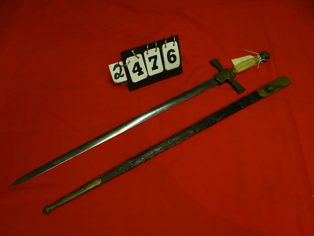 SWORD - ROMAN HELMET - ETCHED BLADE - METAL & BONE: SWORD - ROMAN HELMET - ETCHED BLADE - METAL & BONE HANDLE (DAMAGED) - LEATHER SHEATH - 22'' BLADE / 32'' OVERALL