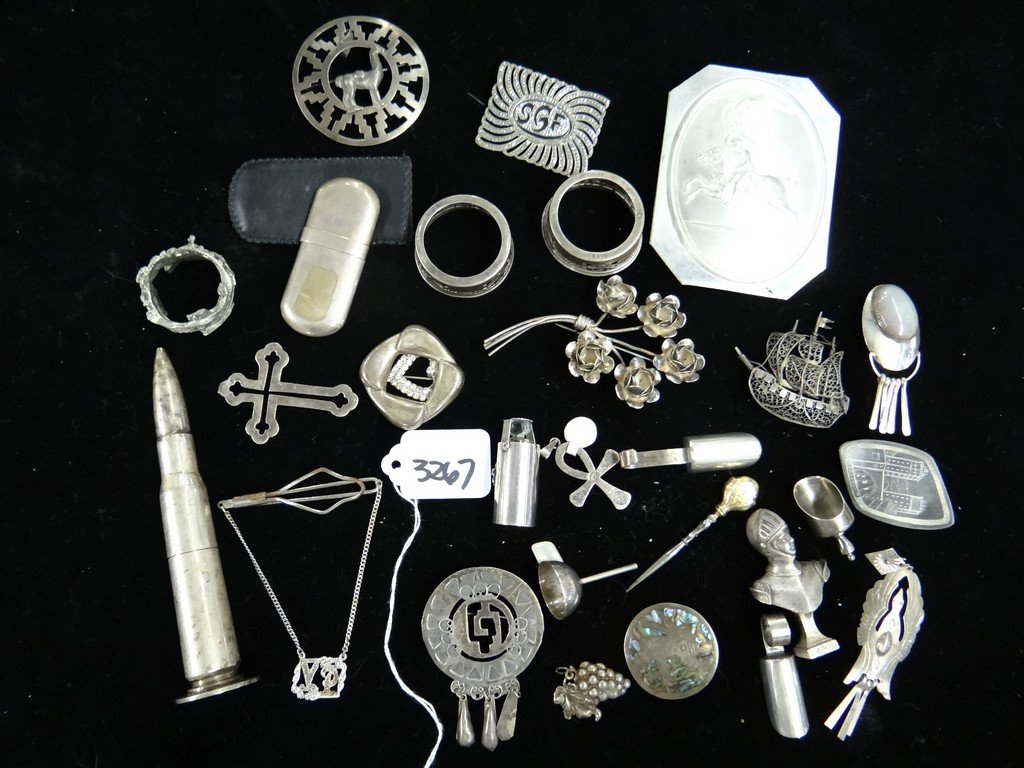 LOT OF 27 PIECES - ASSORTED METAL & STERLING SILVER: LOT OF 27 PIECES - ASSORTED METAL & STERLING SILVER PIECES - STAINLESS STEEL POCKET LIGHTER / PINS / MEDALLIONS / NAPKIN RINGS / ASSORTED LIGHTERS