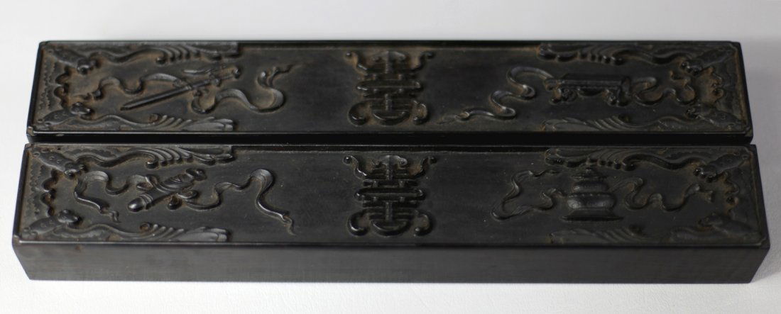 PAIR OF RELIEF EBONY PAPERWEIGHT: Republic Period. L: 12"