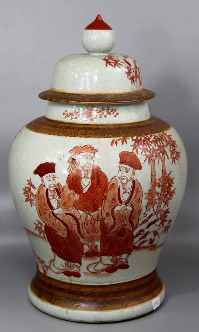 RED COVERED JAR WITH FIGURES: H: 15