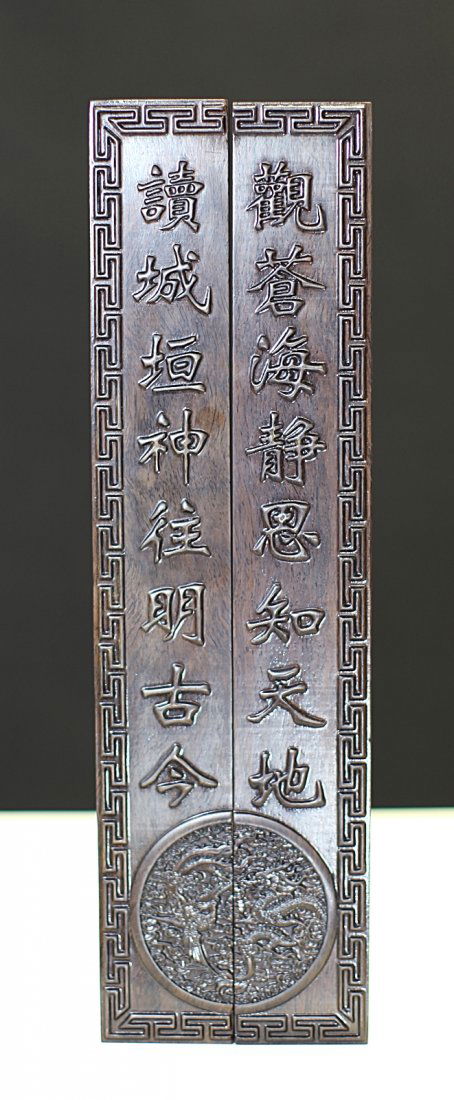 PAIR OF EBONY PAPER WEIGHTS: 2.25*1.2*15"