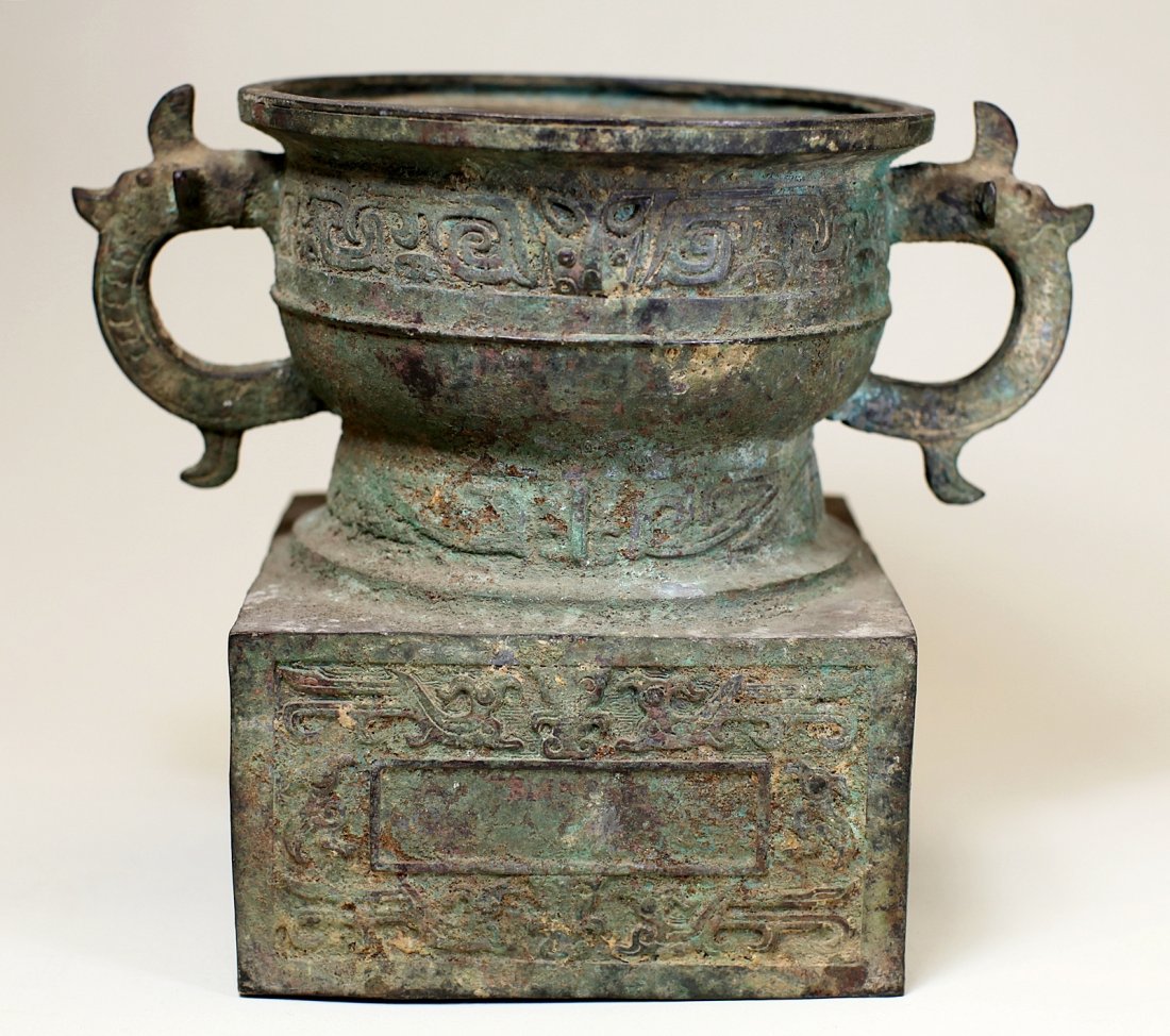 BRONZE GUI WITH SQURE STAND: Eastern Zhou Dynasty; D: 7", H: 8"; There're sevral gilted words inside.