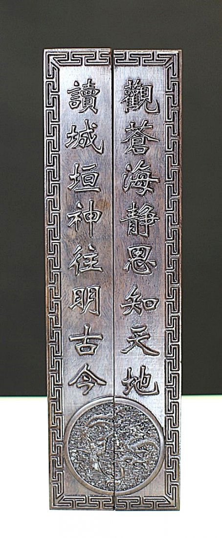 PAIR OF EBONY PAPER WEIGHTS: 2.25*1.2*15"