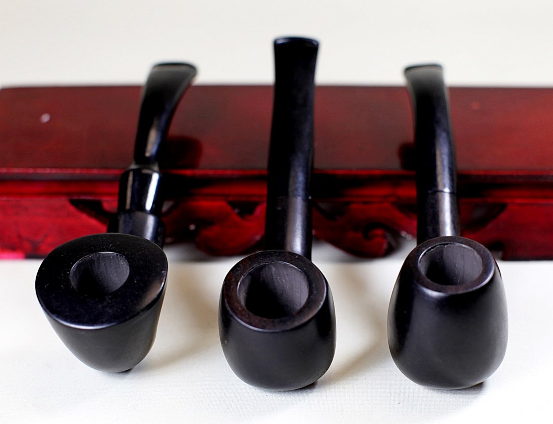 THREE EBONY TOBACCO PIPES: 20th Century; L:5.5"