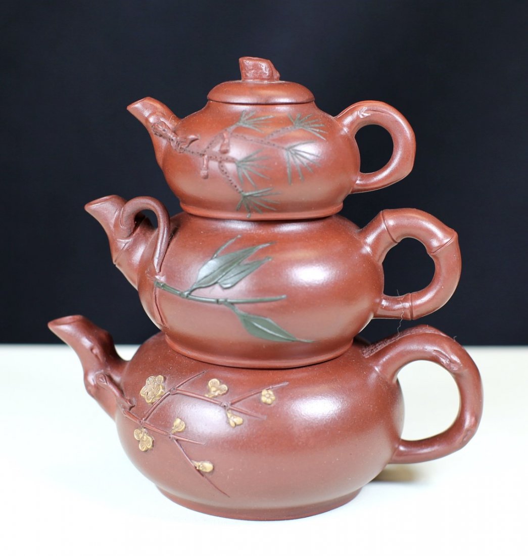 TRIPLE OF ZISHA POTTORY TEAPOTS: 19th Century; H: 6.5"