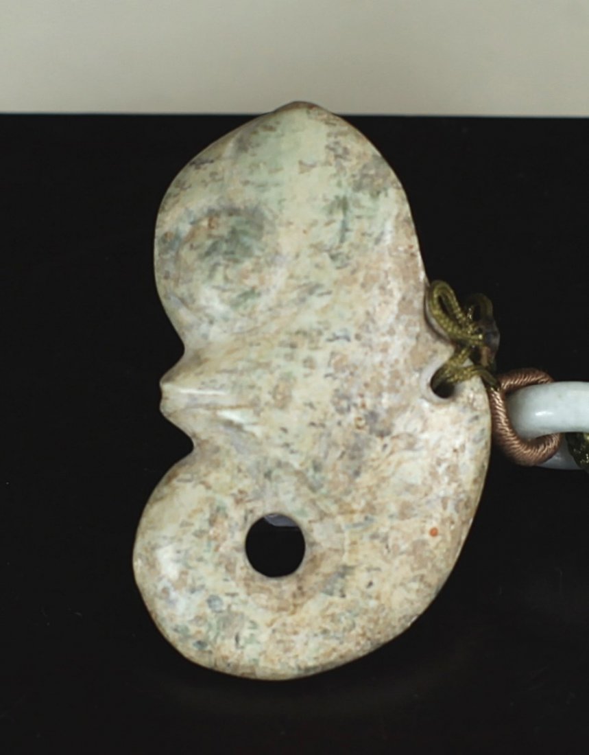 OLD JADE CARVING WITH BIRD DESIGN: L: 2.4"