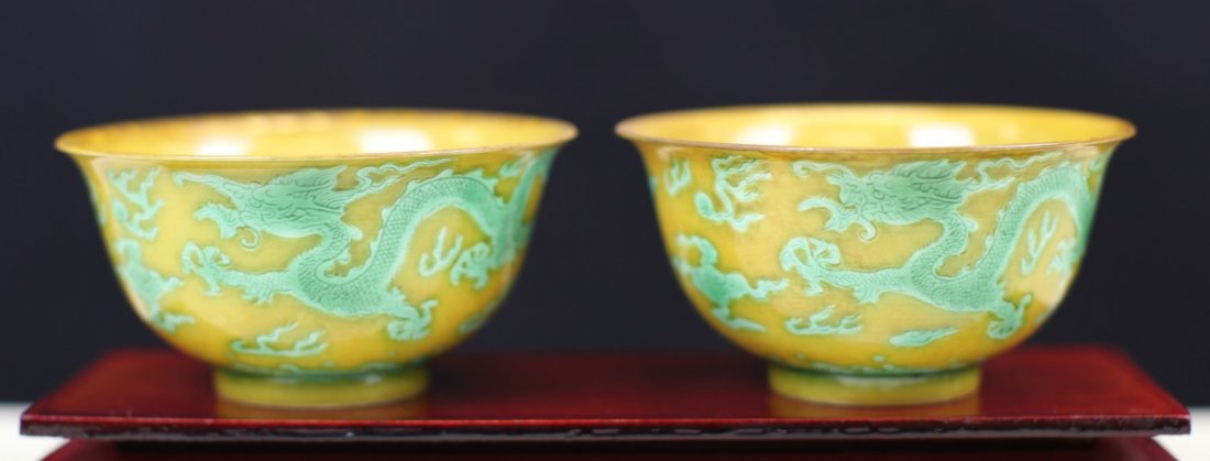 PAIR OF YELLOW GLAZED PORCELAIN BOWLS WITH DRAGON MARKS: 19th Century. D: 4 inch, H: 2 inch