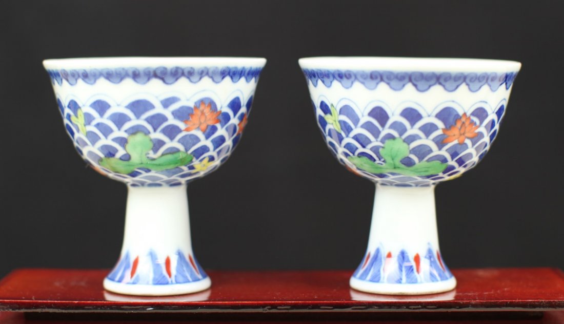 PAIR OF DOU-CAI GLAZED PORCELAIN HIGH-FOOT CUPS: 18th Century. Height: 3.75 inch