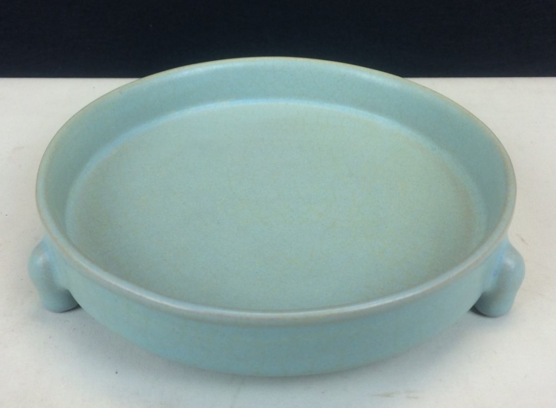 CELADON GLAZED PORCELAIN TRI-FOOT BRUSH WASHER: 18th Century. Diameter: 6 inch, Height: 1.5 inch
