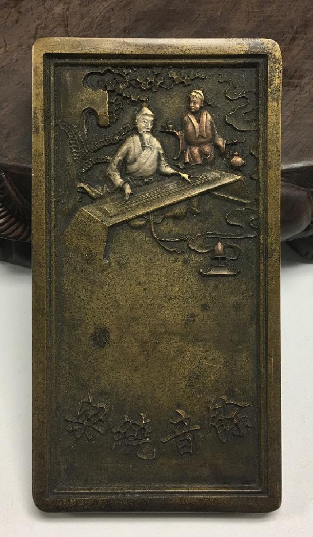 BRONZE INKSTONE: Early 20th Century. Exterior Diameter: 3 inch, Interior Diameter: 2.25 inch. 52g