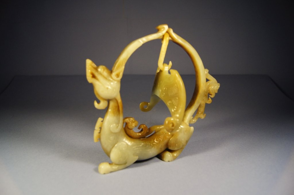 Chinese antique green-brown jade dragon statue: Chinese antique green-brown jade dragon statue, consist of 3 parts ( dragon body , hook and flag ) ,H: 5.5 cm , W: 13 cm