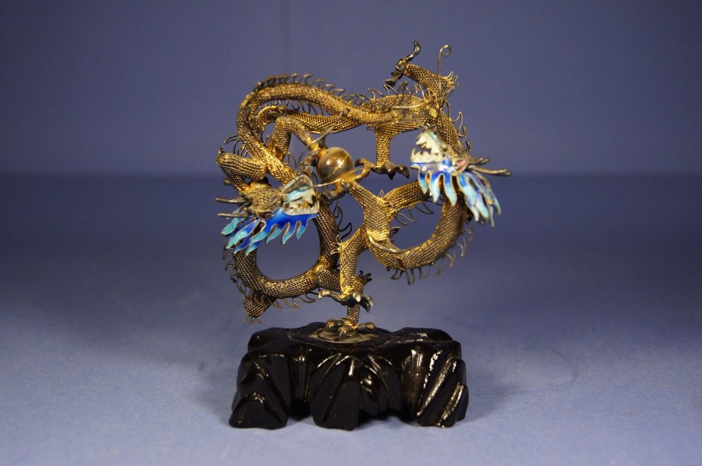 Chinese antique silver dragon statue: Chinese antique silver dragon statue ; Enameled on head ; silver mark ; H: 11 cm