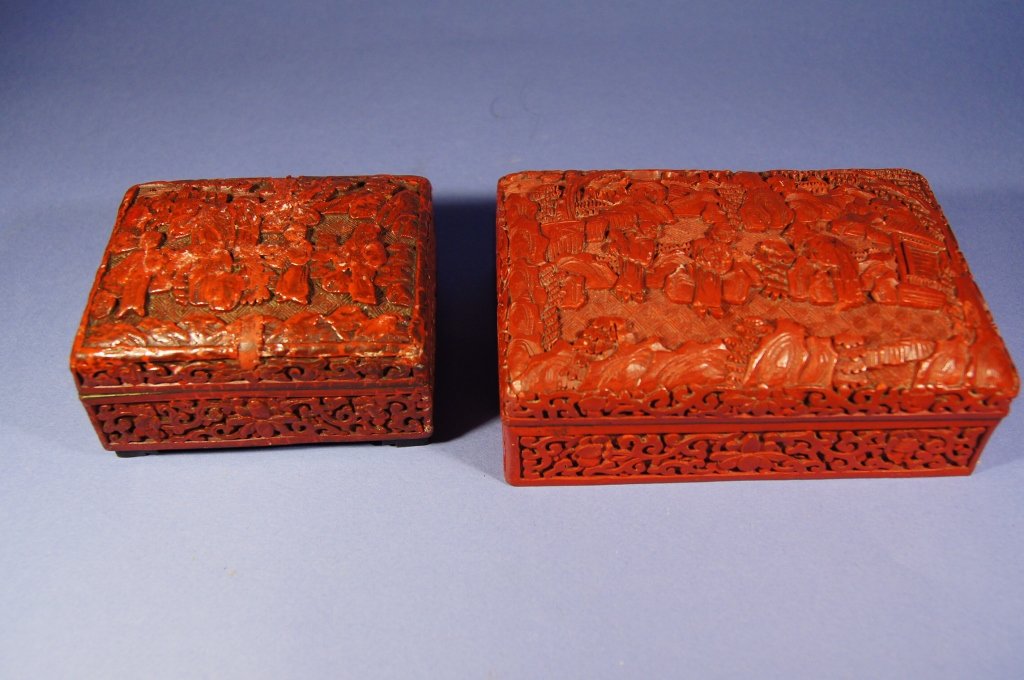 Two Chinese antique cinnabar boxes: Two Chinese antique cinnabar lacquer boxes ; H: 5.5 cm , WL 14.5 cm , L: 10 cm ( large ) H: 5.5 cm , W: 8 cm , L: 10 cm (small)
