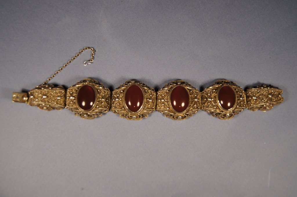 Polish antique Filigree Silver and Amber bracelet: Polish antique Filigree Silver and Amber bracelet ; This silver hallmark is from Poland. It was used from 1920 to 1931. The number 3 indicates the item is made of the third standard - 875 silver. The