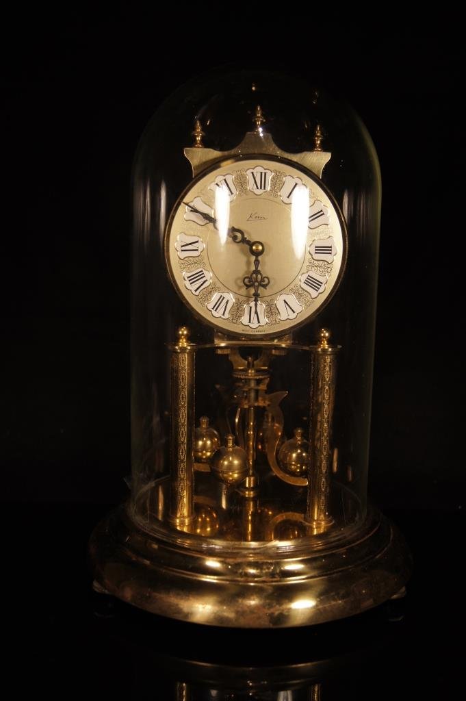 German antique Table clock: German antique Table clock ; Glass cover ; H: 31 cm