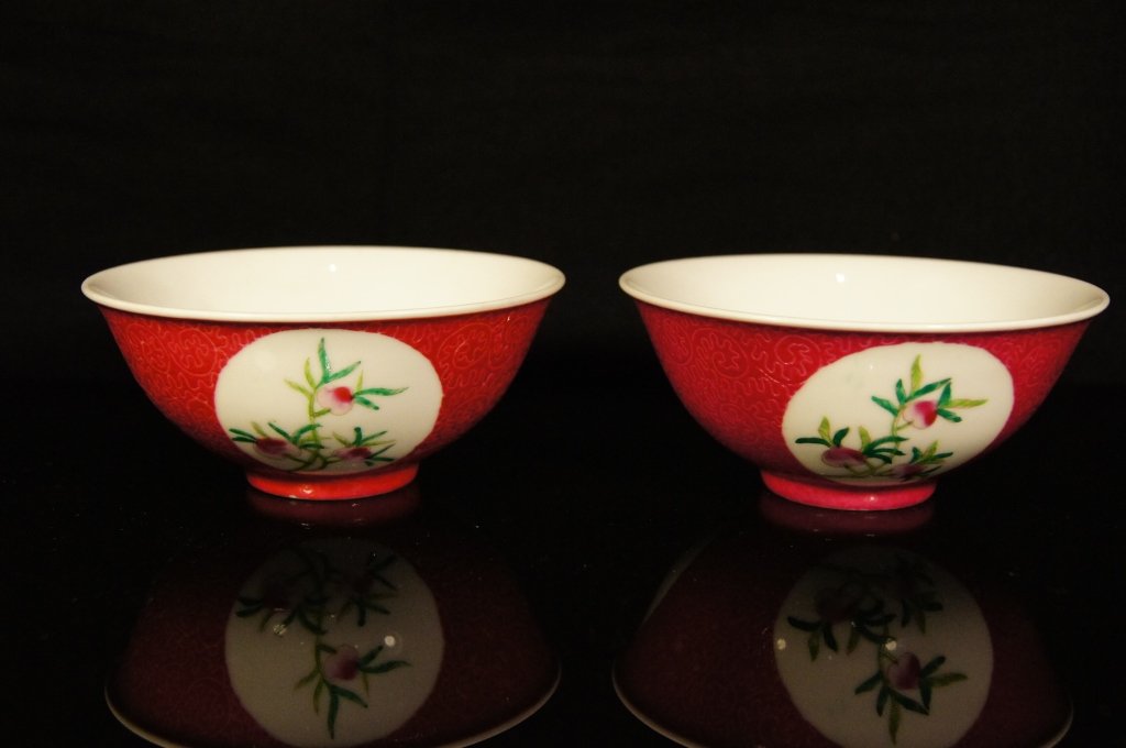 Two Chinese antique Famille Rose bowl ; 19th C: Two Chinese antique Famille Rose bowl ; 19th C ; Peach trees on three faces ; carved continuous pattern ; H: 5.1 cm , D: 11.7 cm