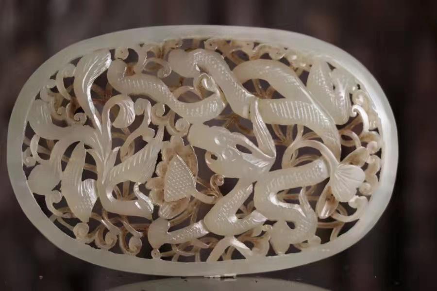 A Fine Carved Hetian Jade Liaojin Pendant (1 of 3)