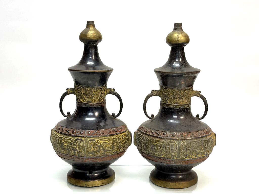 Pair of Tibetan Bronze Caved Bottles (1 of 2)