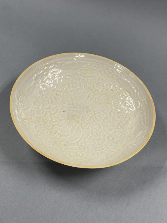 A White Glazed Moulded 'Flowers' Dish (1 of 2)
