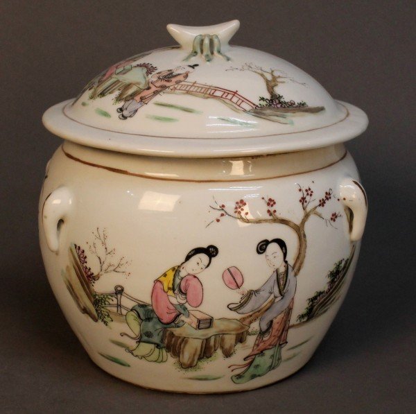 Chinese famille-rose Jar: A Chinese famille-rose jar painted with a lady reading to her son in the back yard, and with Chinese poem on the otherside. Size: 9"x9" Starting Bid: 100