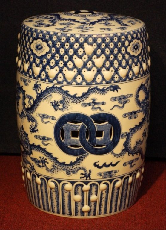 Chinese Blue And White Porcelain Stool: Chinese blue and white porcelain stool painted with dragon Size: 19'' H , 13''D Starting Bid: 200