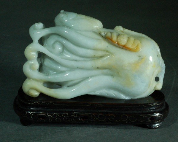 Chinese Carved White Jade Finger Citron: Chinese Carved White Jade Finger Citron The Buddha's hand carved with a leafy stem, the fingers realistically carved to show the skin of the fruit , the white jade stone with light brown strikes. 18th
