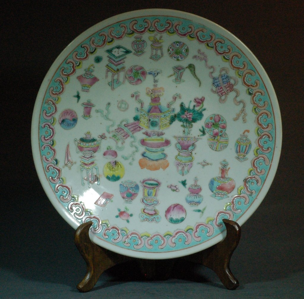 Chinese Qing Famille Rose Charger: Chinese Qing Famille Rose Charger. Painted in the center: a medallion with various religious objects, bordered by floral sprays. Qing Dynasty. Ex-collection from a local collector purchased from New Y