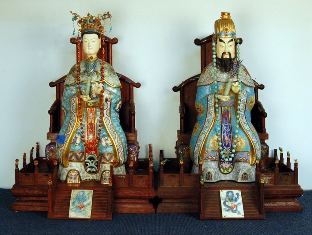 The Ivory Statues of Chinese Emperor and His Wife: The supreme deity of Taoism and his wife WangMu The supreme deity of Taoism and his wife WangMu. Both figures are highly enameled with very detailed painting of every detail. Both stand atop highly ca