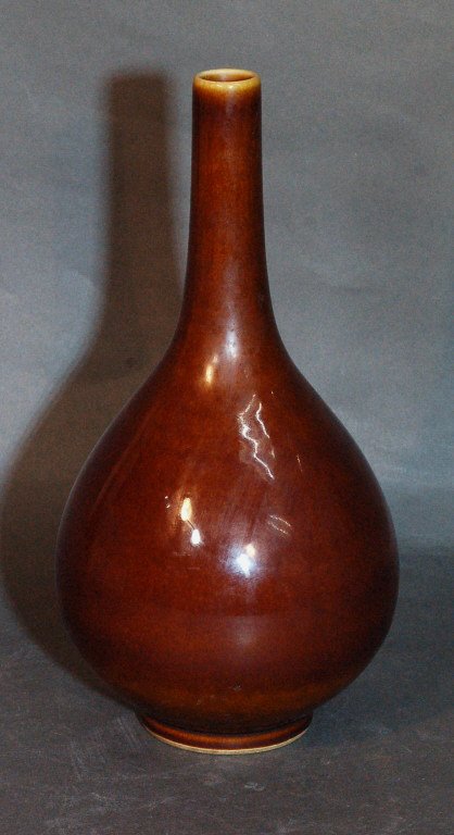 Chinese Brown Glazed Porcelain Vase: Chinese Ming Brown Glazed Porcelain Vase, with color varying between brown and yellow & having a 6 character mark to base. Size: D 5 1/2",H11" Starting Bid: 200