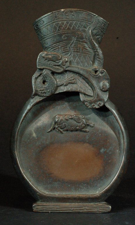 Chinese Old Mirror-shaped Duan Inkstone: 端石古镜形砚台 Chinese Old Mirror-shaped Duan Inkstone Size: W4" H6 1/2" Starting Bid: 250