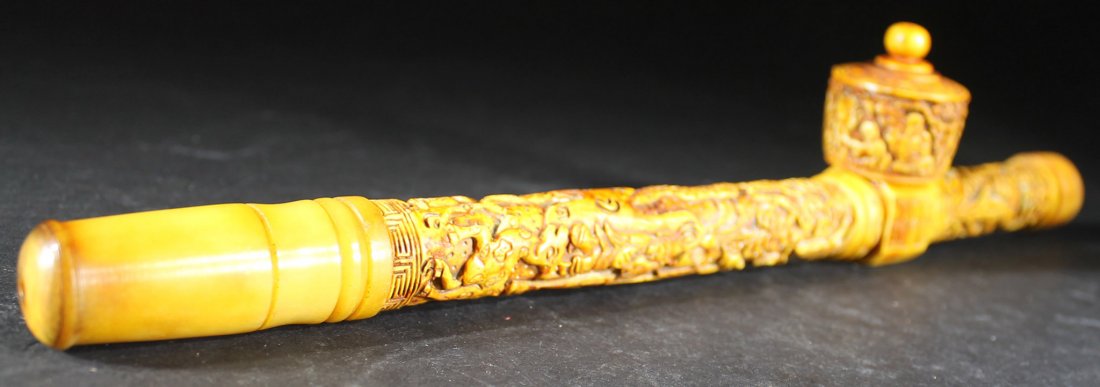 Old Highly Carved Pipe: Old Pipe with Carved Dragon. Size:L:14 1/2", W:3" Starting Bid: 100