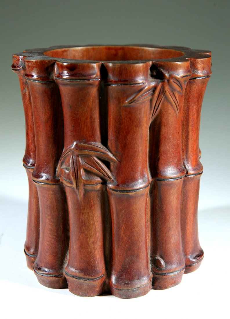 Carved Hardwood Pen Holder: Bamboo-like Carved pen holder Size:D:6" H:6 3/4" Starting Bid: 125