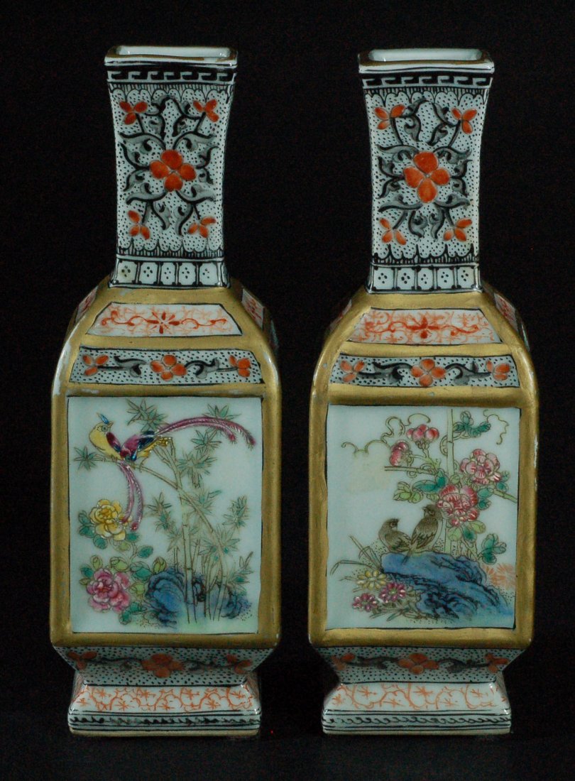 Pair of Chinese Famille Rose Square Form Vases: Pair of Chinese Famille Rose Square Form Vases with Six Chinese Characters to the Base Size:H:6 3/4W:2 1/4 Starting Bid: 150