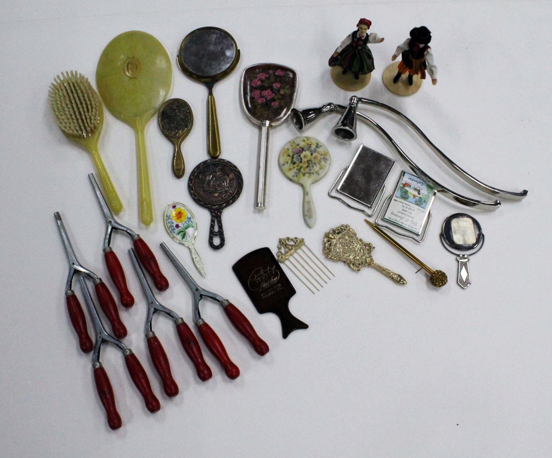 Large Dresser Lot: Vanity mirrors, brushes, hair rollers, and more. dated from 1900 through 1980 Starting Bid: 50