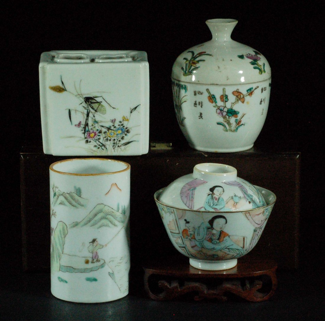 Lot of 4 Chinese Famille Rose Items: 2 Chinese Famille Rose Pen Holders, lidded cup and lidded bottle. Size:H:5", H:3", H:4 1/2" Starting Bid: 150