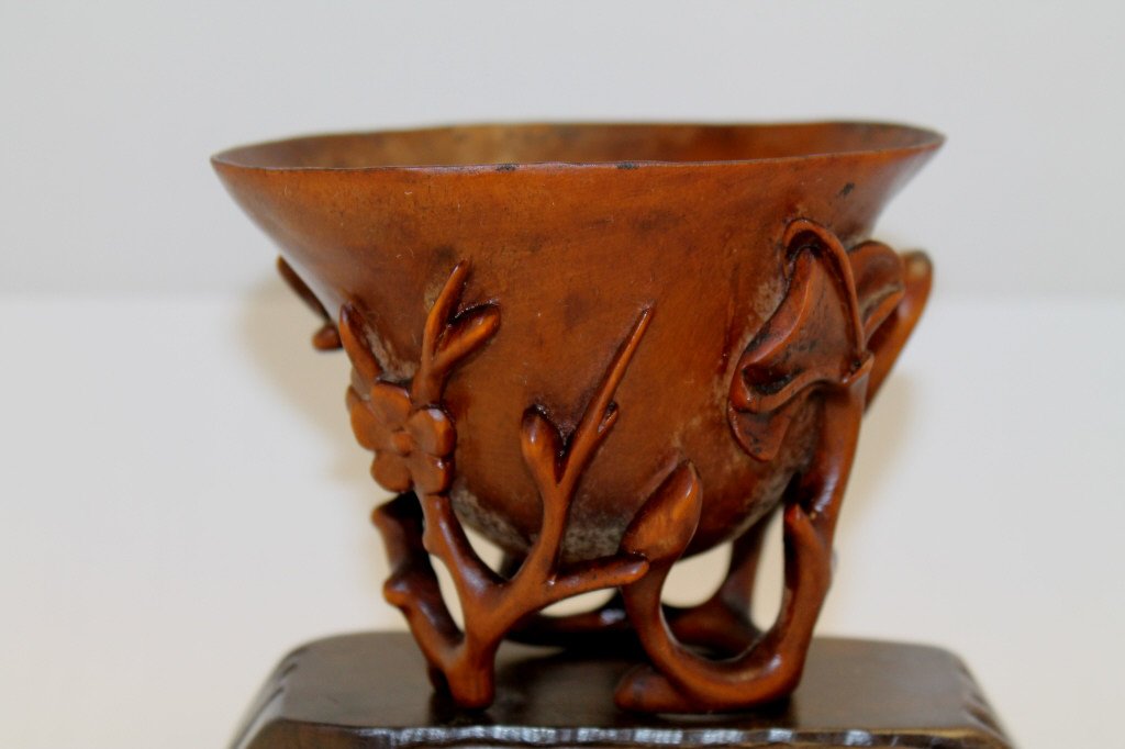 Carved Huanghuali Brush Washer: A carved huanghuali brush washer, the bowl atop openwork branches and blossoms. Size: 3 1/2" H