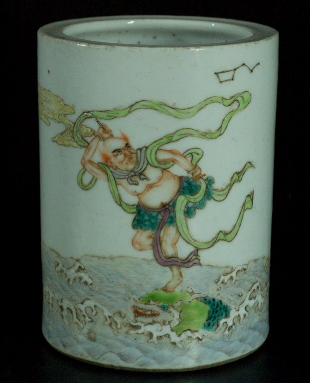 Chinese Famille Rose Brush Pot: Republic Period, depicting a mythical figure atop a sea dragon, calligraphy to reverse. Size: 3 1/2" dia. x 4 3/4" H
