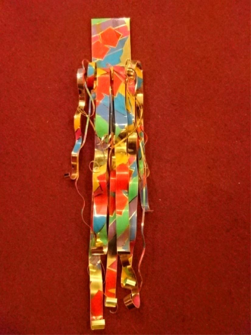 DOROTHY GILLESPIE METAL RIBBON SCULPTURE, ENAMEL ON: DOROTHY GILLESPIE METAL RIBBON SCULPTURE, ENAMEL ON GOLD FINISH ALUMINUM, SIGNED DOROTHY GILLESPIE ON RIBBON EDGE, TITLED "ROYAL COLOR AND SHADOW 2000" ON VERSO, VERY GOOD CONDITION, 48" X 13" X 6", S