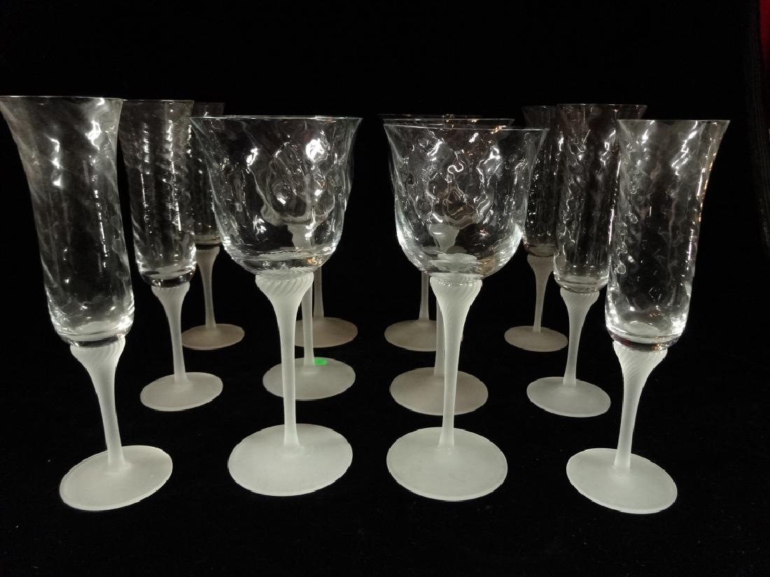 12 HAND BLOWN CRYSTAL WINE GLASSES, 6 CHAMPAGNES AND 6: 12 HAND BLOWN CRYSTAL WINE GLASSES, 6 CHAMPAGNES AND 6 WINE, FROSTED GLASS STEMS, SPIRAL TWIST DESIGN, WINE APPROX 9"H, CHAMPANGES APPROX 9.5", HAND BLOWN SO INDIVIDUAL SIZES VARY SLIGHTLY, VERY GOOD