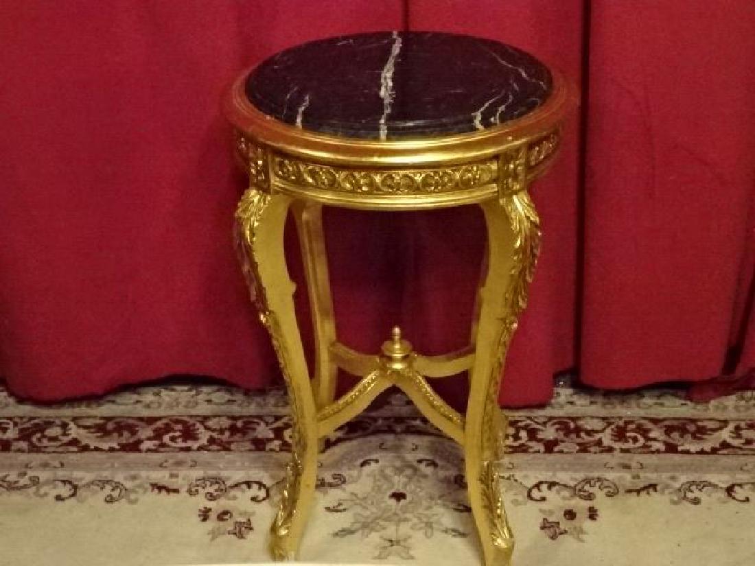 LOUIS XV STYLE GOLD GILT WOOD TABLE, BEVELED BLACK: LOUIS XV STYLE GOLD GILT WOOD TABLE, BEVELED BLACK MARBLE TOP, VERY GOOD CONDITION, 28"H X 18.5"W, SKU317.11