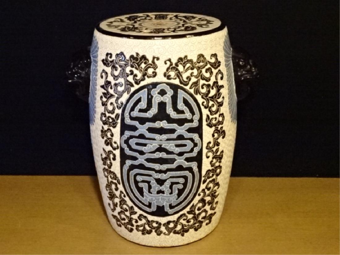 CHINESE PORCELAIN GARDEN STOOL WITH LION HEAD HANDLES,: CHINESE PORCELAIN GARDEN STOOL WITH LION HEAD HANDLES, WHITE WITH BLACK AND BLUE FOLIATE DESIGNS, VERY GOOD CONDITION, 18"H X 16"W, SKU355.45
