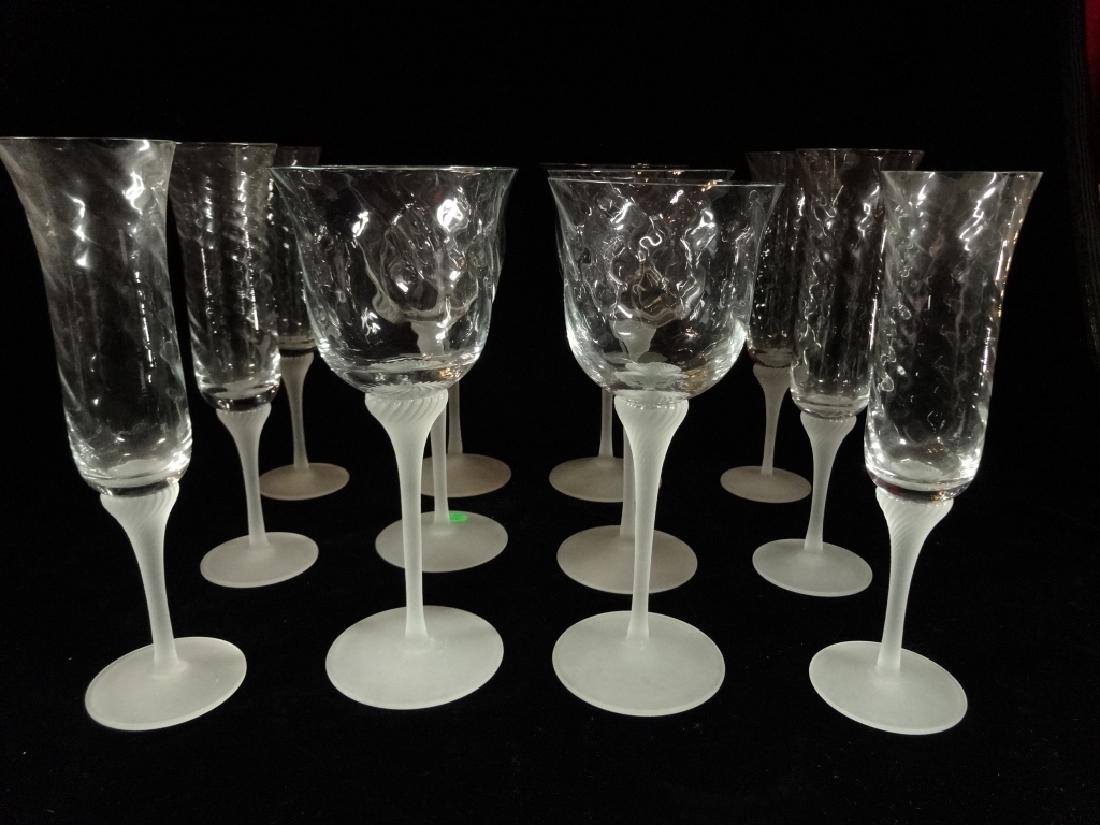 12 HAND BLOWN CRYSTAL WINE GLASSES, 6 CHAMPAGNES AND 6: 12 HAND BLOWN CRYSTAL WINE GLASSES, 6 CHAMPAGNES AND 6 WINE, FROSTED GLASS STEMS, SPIRAL TWIST DESIGN, WINE APPROX 9"H, CHAMPANGES APPROX 9.5", HAND BLOWN SO INDIVIDUAL SIZES VARY SLIGHTLY, VERY GOOD