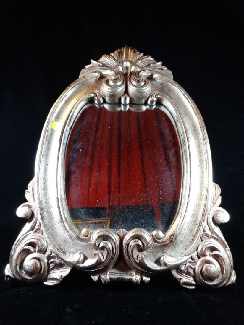 SILVERTONE MIRROR ON STAND, APPROX 22" X 15" (1 of 3)