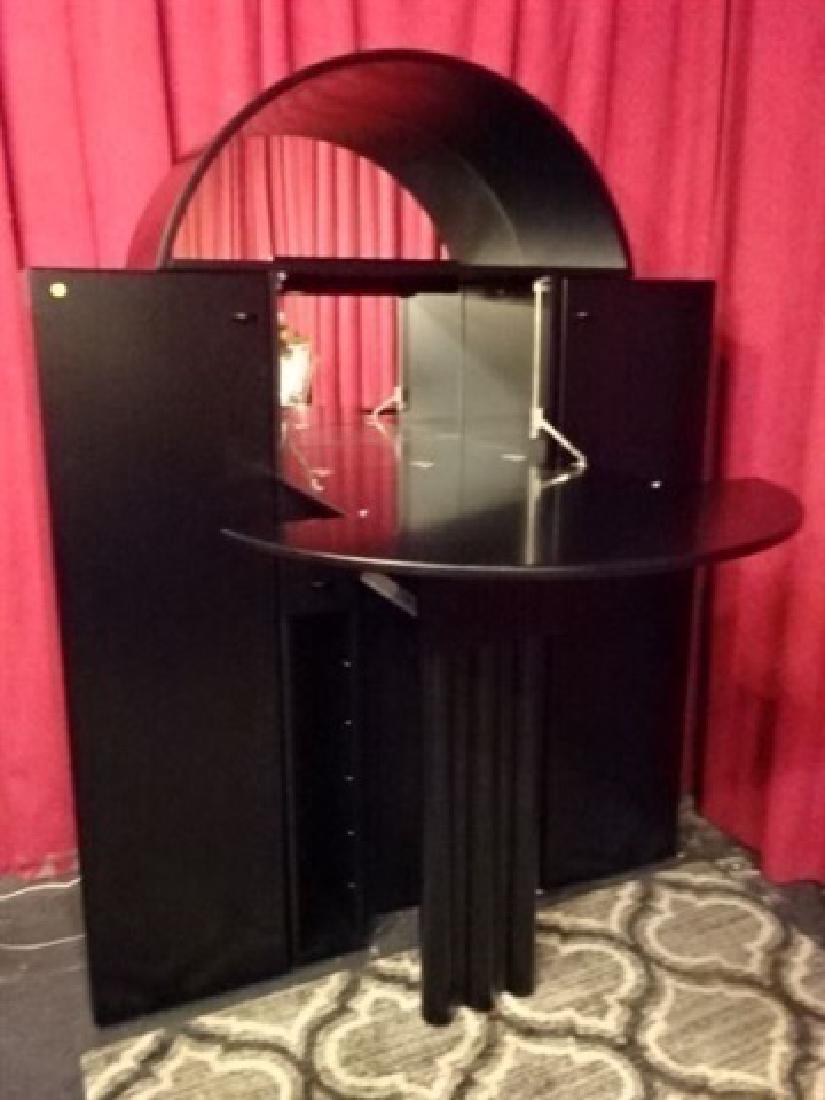 INTERLUBKE LIGHTED BAR CABINET WITH DROP DOWN BAR: INTERLUBKE LIGHTED BAR CABINET WITH DROP DOWN BAR COUNTER, LIGHTED MIRRORED BACK, DOME TOP, TWIN CABINETS, BAR COUNTER FOLDS UP TO ENCLOSE CABINET, VERY GOOD CONDITION, WITH ORIGINAL INSTRUCTION BOOKL