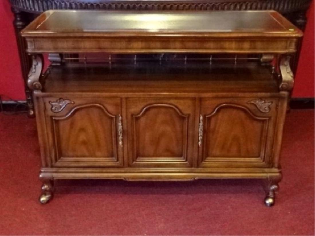 WOOD AND BRASS BUFFET CABINET ON CASTERS, UNDERTIER (1 of 9)