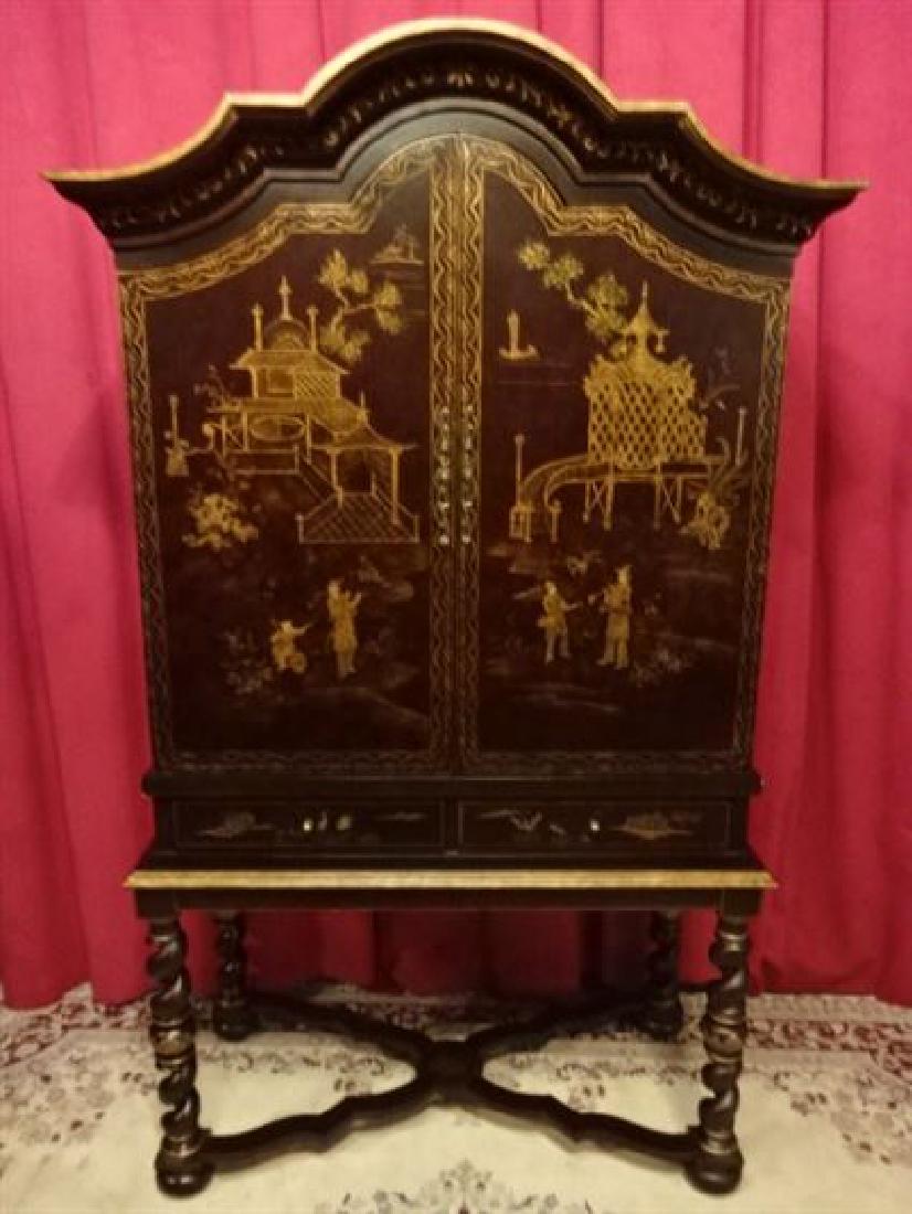 CHINOISERIE GILT DECORATED CABINET, BLACK ENAMEL: CHINOISERIE GILT DECORATED CABINET, BLACK ENAMEL CRAQUELURE FINISH WITH PAINTED GOLD LANDSCAPES AND PAVILIONS, 2 DOORS ABOVE 2 DRAWERS, DOME TOP, RAISED ON 4 SPIRAL TWIST LEGS JOINED BY STRETCHERS, VE