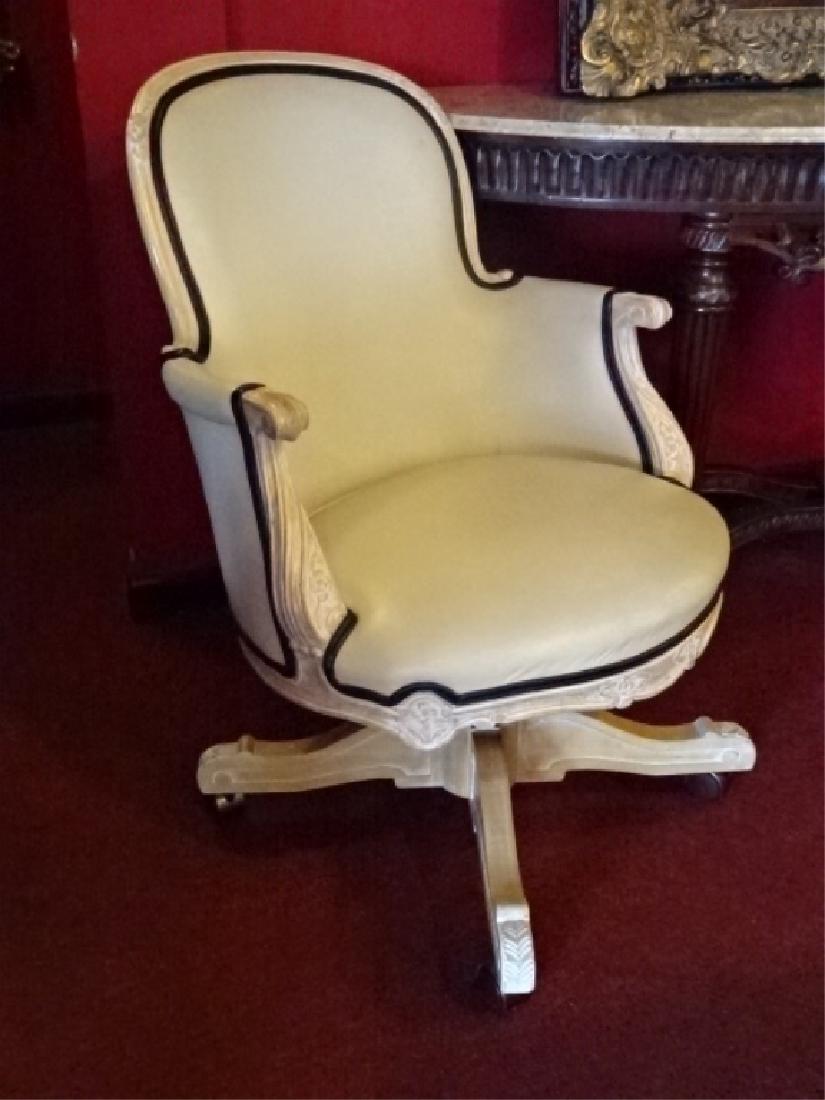FRENCH STYLE DESK ARMCHAIR ON CASTERS, BONE LEATHER: FRENCH STYLE DESK ARMCHAIR ON CASTERS, BONE LEATHER UPHOLSTERY, LIGHT ANTIQUED WHITE FINISH, VERY GOOD CONDITION, APPROX 45" X 34" X 36" , SKU473.03