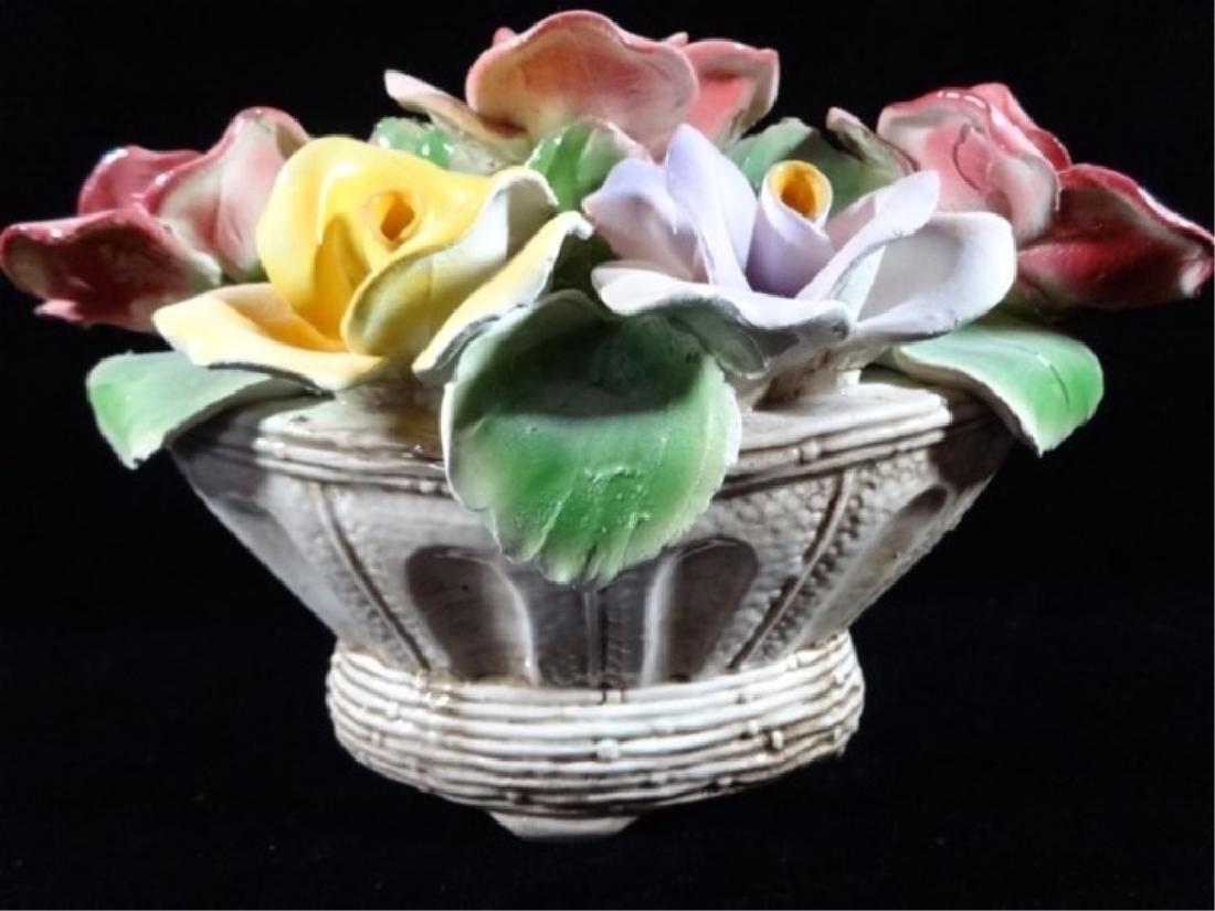 LARGE CAPODIMONTE ITALIAN PORCELAIN FLOWERS IN WHITE: LARGE CAPODIMONTE ITALIAN PORCELAIN FLOWERS IN WHITE PLANTER, WITH N AND CROWN MARK, MADE IN ITALY, VERY GOOD CONDITION WITH A COUPLE MINOR CHIPS TO PETALS, 10"H X 11"W, SKU454.23