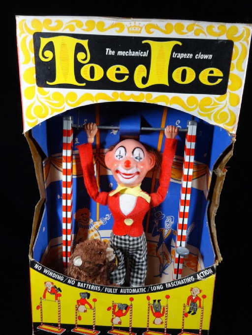 vintage toe joe mechanical trapeze clown toy by ohio